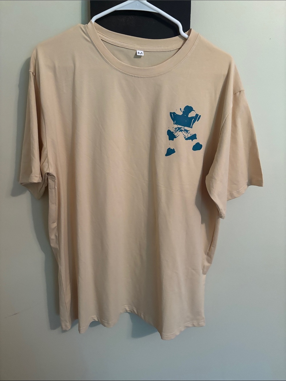 Men's Beige Graphic Tee with Turquoise Accent